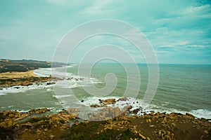 Beautiful sea with waves and mountains.Aerial view.Mui Ne, Phan Thiet, Vietnam.