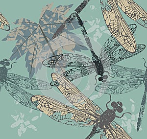 Beautiful seamless pattern with maple leaf and dragonflies