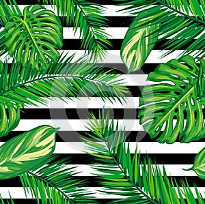 Beautiful seamless tropical jungle floral pattern background with palm leaves