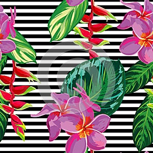 Beautiful seamless tropical jungle floral pattern background with palm leaves and flowers.