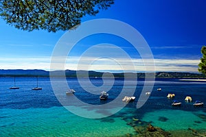 Beautiful seascape on Adriatic bay with yachts and Zlatni rat be