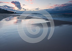 Beautiful seascape with Baltic sea shore after sunset