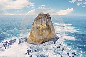 Beautiful seascape with big stone on Papuma beach