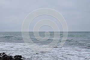 Beautiful seascape. Black Sea. Waves. Pebble beach.