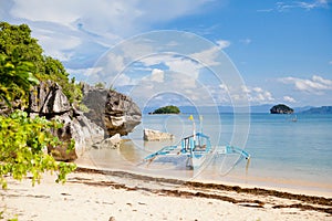 Beautiful seascape with a boat. Rocks by the sea on Caramoan Island, Philippines, Asia. Beautiful seascape