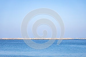 Beautiful seascape with clear blue sky on a sunny day and copy space