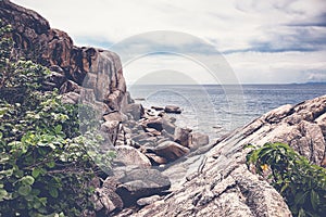 Beautiful seascape, cloudy weather, a stone beach, image with r