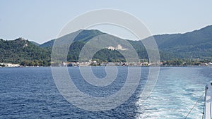 Beautiful seascape with forested mountains in the background