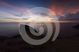 Beautiful Seascape with sea and rock on sunset background