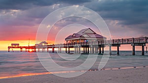 Beautiful seascape with sunset. Fishing pier. Summer vacations. Clearwater Beach Pier 60. Ocean or Gulf of Mexico. Florida paradis