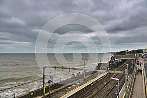 Beautiful seascape view along railway view from pedestrian crossing bridge at Blackrock train station, Dublin, Ireland. Amazing