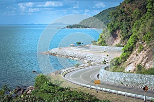 Beautiful Seascape Viewpoint of the road beside blue sea that is landmark at Kung Wiman Bay in Chanthaburi Province.