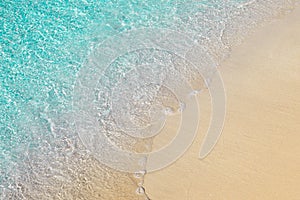 Beautiful seashore with clear transparent blue water and sand