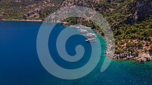 Beautiful seashore. Islands in the distance. Colorful blue sea. The beauty of Turkey. Beautiful rocks and mountains.