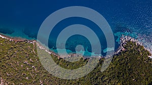 Beautiful seashore. Islands in the distance. Colorful blue sea. The beauty of Turkey. Beautiful rocks and mountains.