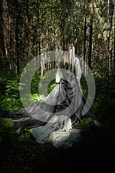 Beautiful seductive dryad. Pagan spirit of the forest. Portrait of beautiful dryad. Fairy who loves nature in beautiful