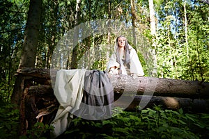 Beautiful seductive dryad. Pagan spirit of the forest. Portrait of beautiful dryad. Fairy who loves nature in beautiful