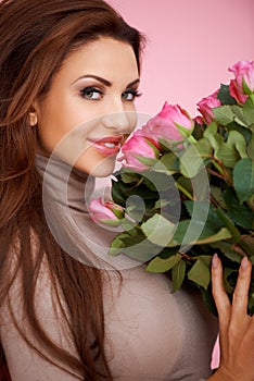 Beautiful seductive woman with roses