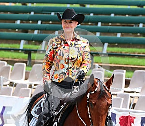 A Beautiful Senior Citizen Rides A Horse At The Germantown Charity Horse Show