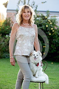 A beautiful senior woman in her garden