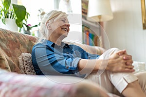 Beautiful senior woman relaxing at home