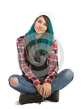 Beautiful serene girl sitting cross-legged