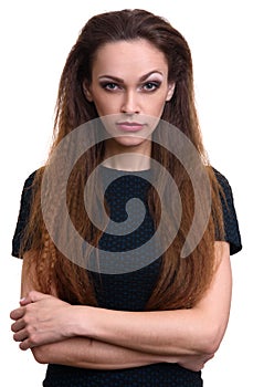 Beautiful serious woman with long hair isolated