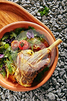 Beautiful Serving Homemade Buglama or Shin of Lamb with Vegetables photo