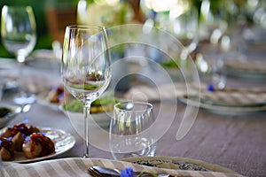 beautiful setting of a table with empty glasses. tableware shop.
