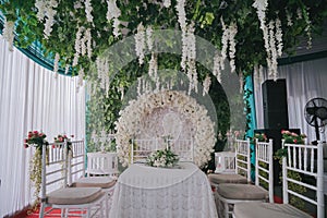 Beautiful setup for a wedding ceremony with white flowers