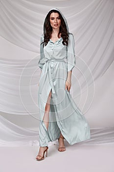 Beautiful sexy brunette woman wear summer collection dress style cruise collection fashion model silk textile elegant clothes