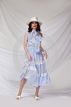 Beautiful sexy brunette woman wear summer collection dress style cruise collection fashion model silk textile elegant clothes