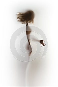 Beautiful and sexy, erotic woman body and blowing hair with hand, diffuse silhouette abstract.