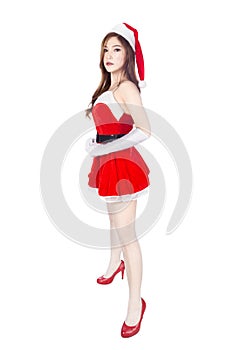 Beautiful girl wearing santa claus clothes isolated on whit