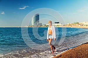 Beautiful sexy shemale woman posing at the beach photo