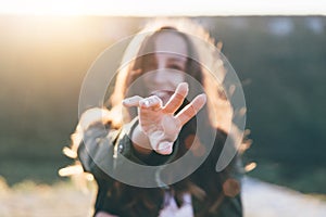 Beautiful sexy young woman smiling on beautiful landscape in sunset time