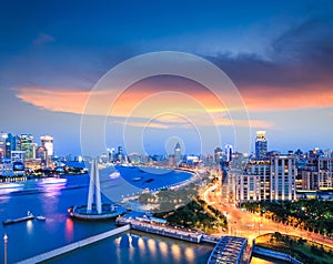 Beautiful shanghai the bund with sunset clouds