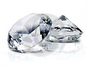 Beautiful shiny diamonds, on white background photo