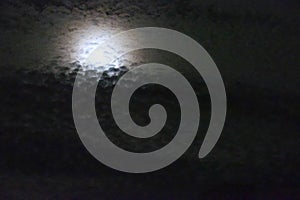 Beautiful shiny full moon with clouds