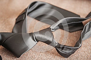 Beautiful, shiny gray tie for the groom