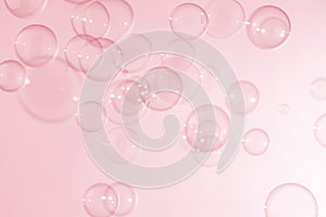 Beautiful shiny transparent pink soap bubbles float texture background. freshness natural summer background.