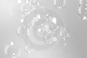 Beautiful shinytransparent soap bubbles float texture background. freshness natural background