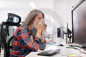 Beautiful Shocked and Annoyed Young Woman Looking her desktop. Sad Operator Agent Woman Working from Home in a Call