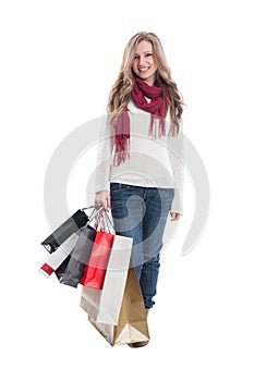 Beautiful shopping lady holding bunch of shopping bags