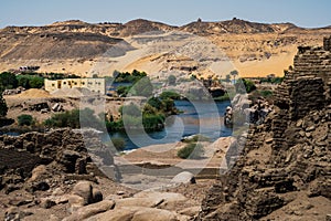 Beautiful shot of Asuan in Egypt with desert dunes in the background photo