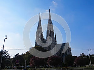 Beautiful shot of a cathedral in Sigmund-Freud Park, Vienna, Austria