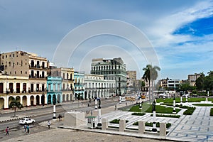 Beautiful shot of colorful buildings against Fraternidad Park with the Hotel Saratoga in Havana,Cuba