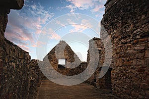 Beautiful shot of Craigmillar Castle from inside against cloudy sky at sunset photo