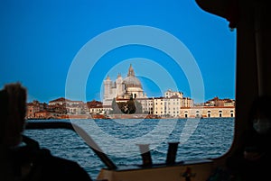 Beautiful shot from a cruise boat of the Basilica di Santa Maria Della Salute in Venice