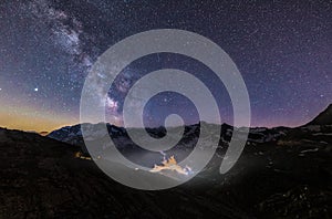 Beautiful shot of Gran Paradiso Park, Alps, Valle d'Aosta, Italy under a starry night sky